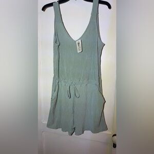 Sweet boutique Ces Femme Seafoam green sleeveless romper. NWT